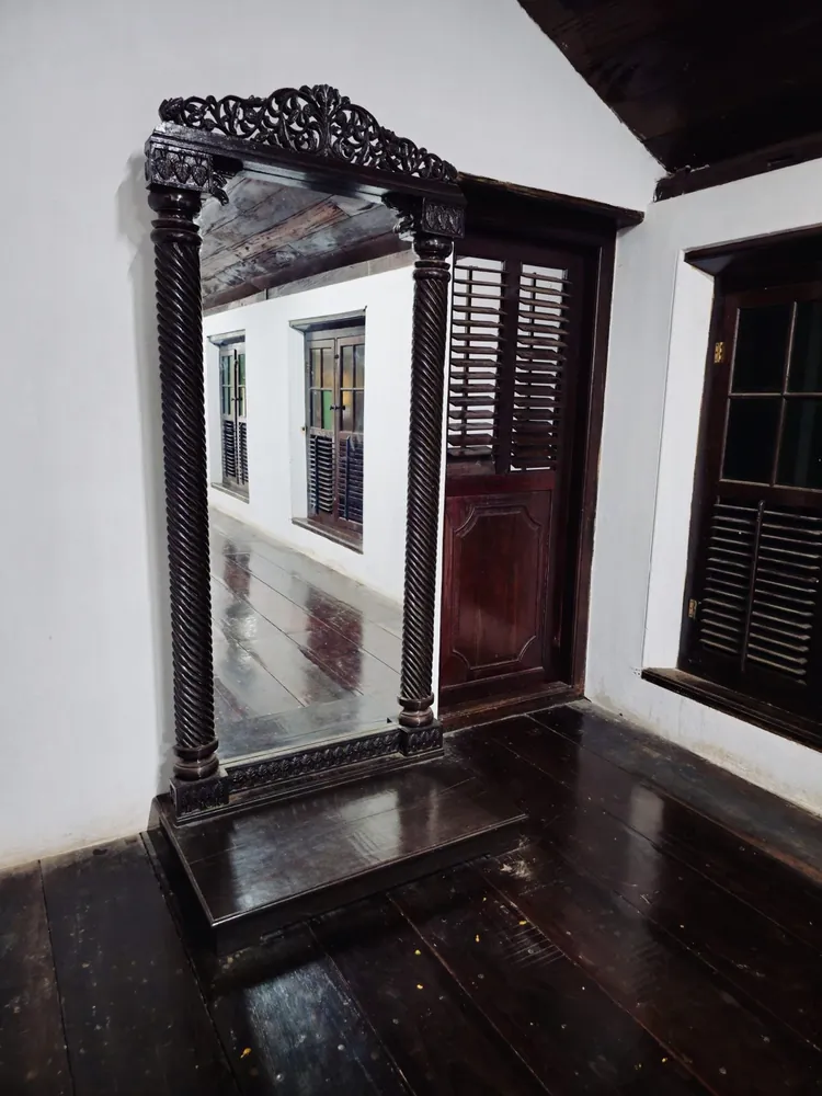 Carved Dark Wood Floor Mirror