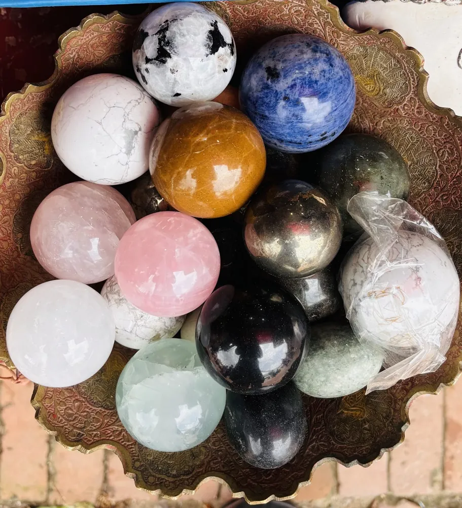 Polished Gemstone Spheres in Bowl